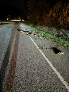 Car Damaged by Road Debris