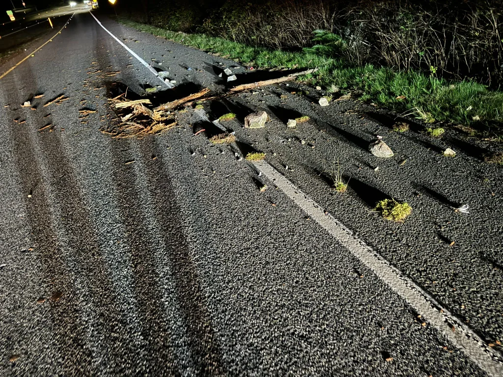 Car Damaged by Road Debris