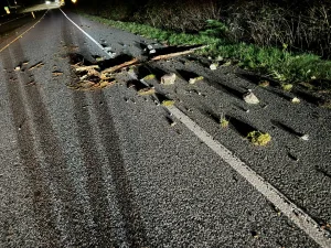 Car Damaged by Road Debris